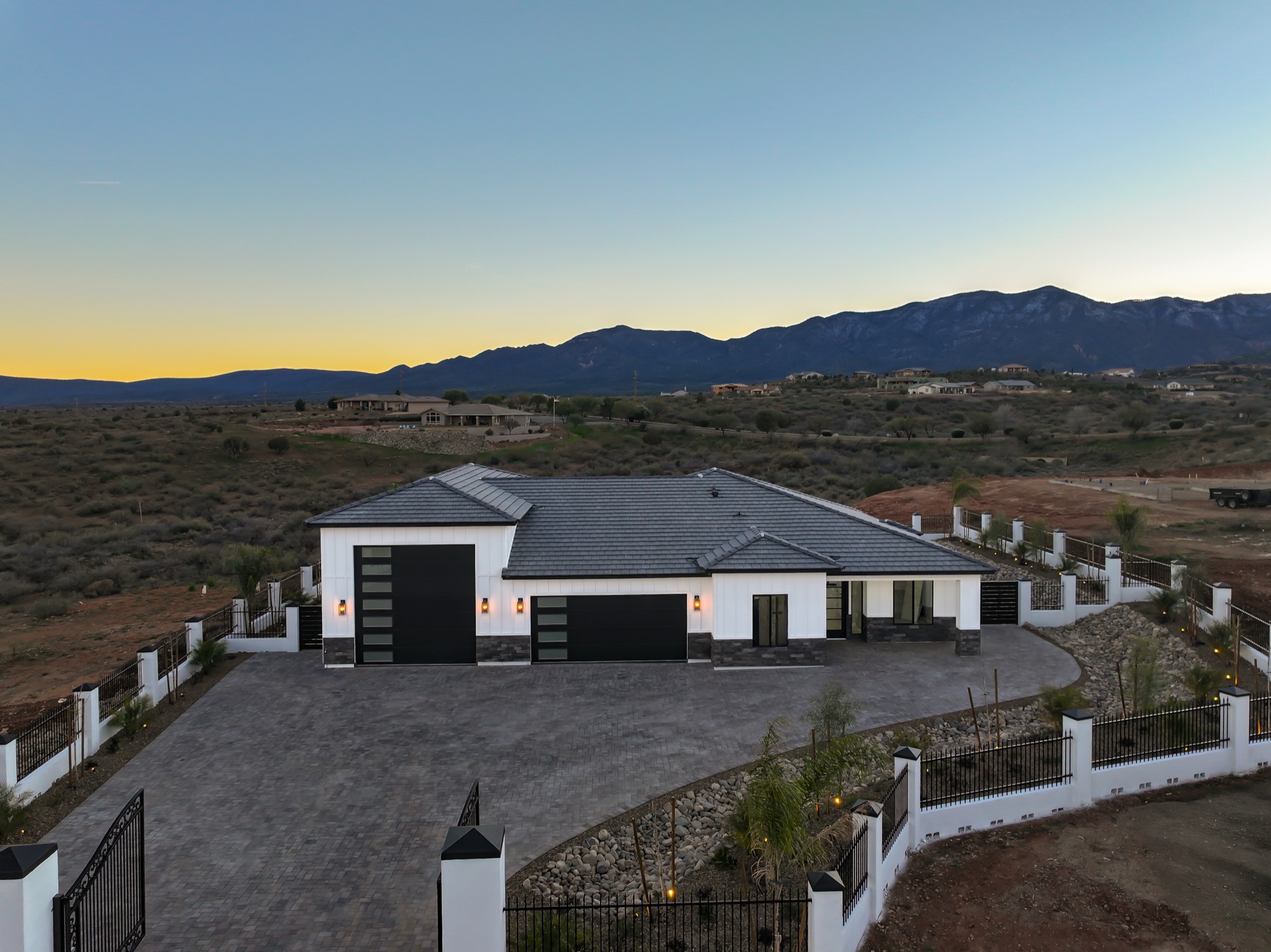 Dusk aerial with the Mingus Mountains on the horizon