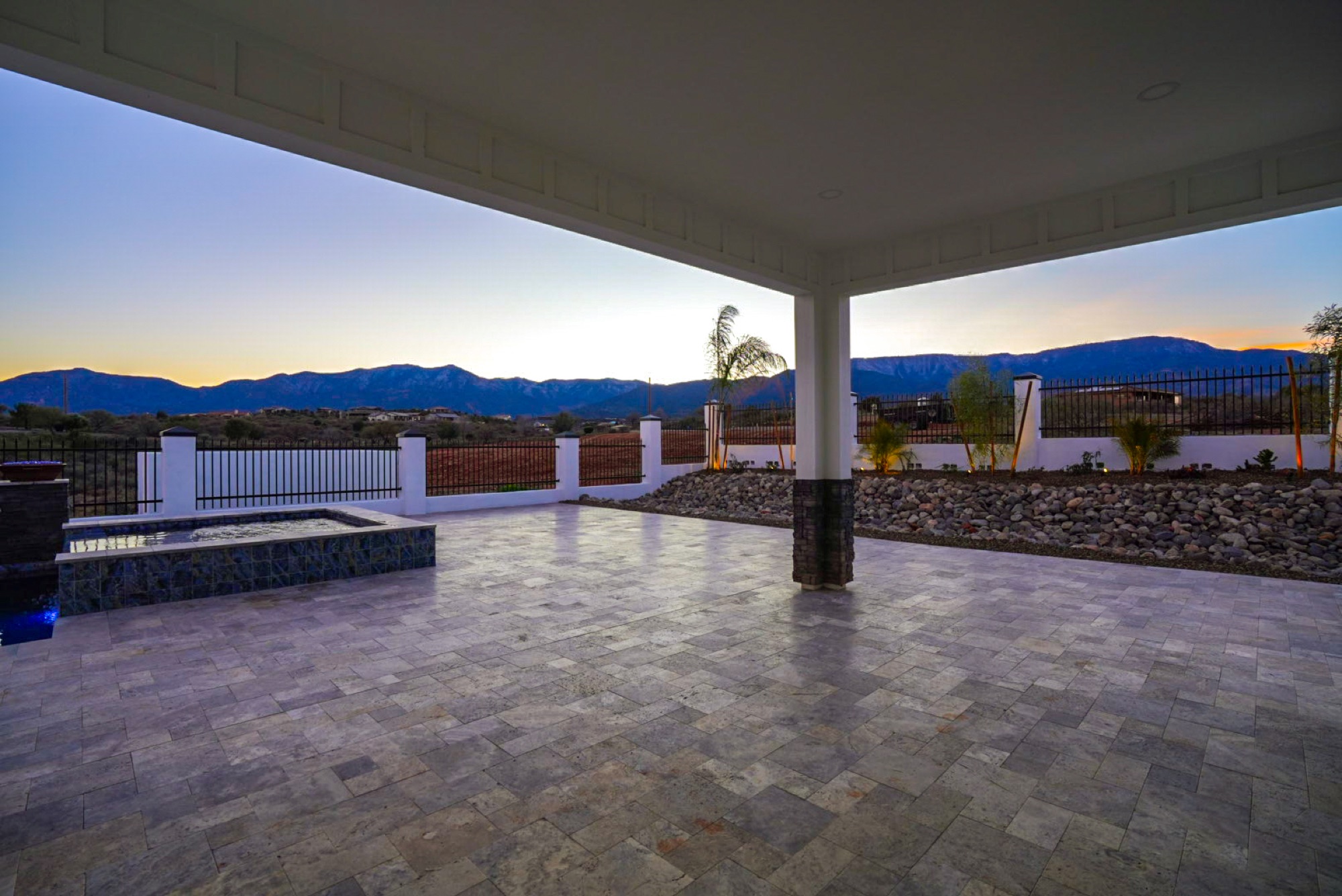 Covered patio at dusk overlooking the Mingus Mountains
