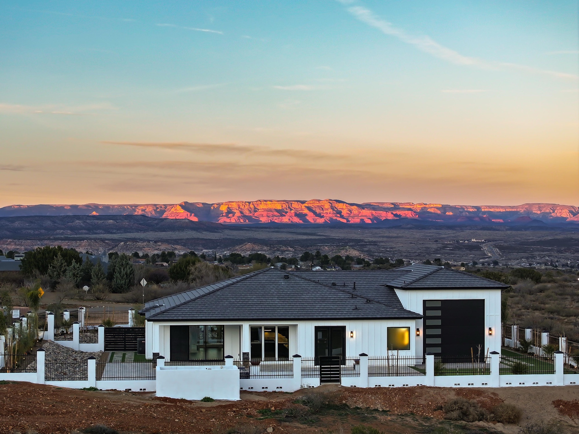 Sunset over the Verde Valley with glowing red rock cliffs